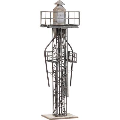 A large-scale iron structure that looks like a tower or a technical model with railings and platforms.