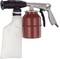 A sandblasting machine with a metal housing, black handle, and dust collection bag. Used for cleaning surfaces.