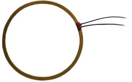 Round, flat copper wire with two protruding black cables, possibly an electromagnetic coil.