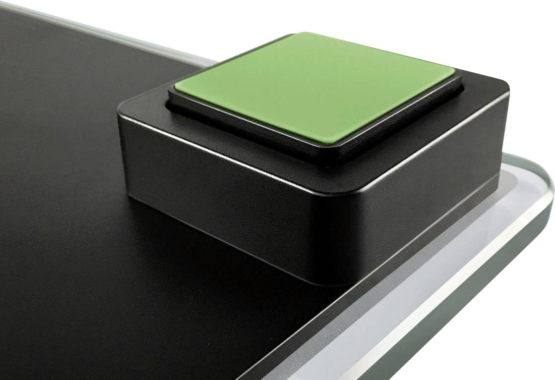 A green, square button on a black, rectangular base; used for operating or controlling a device.