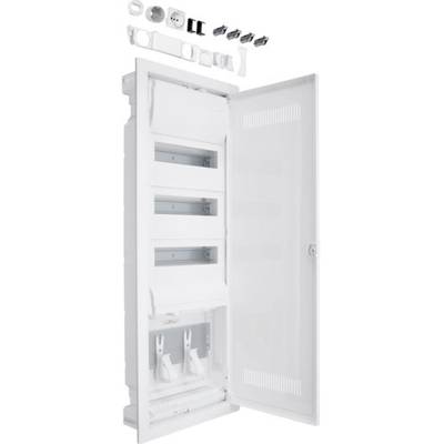 An open, white electrical cabinet with multiple empty compartments and a transparent lower section, with accessories placed on top.