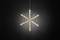 A luminous glass snowflake pendant, suspended against a dark background, illuminated and decorative.
