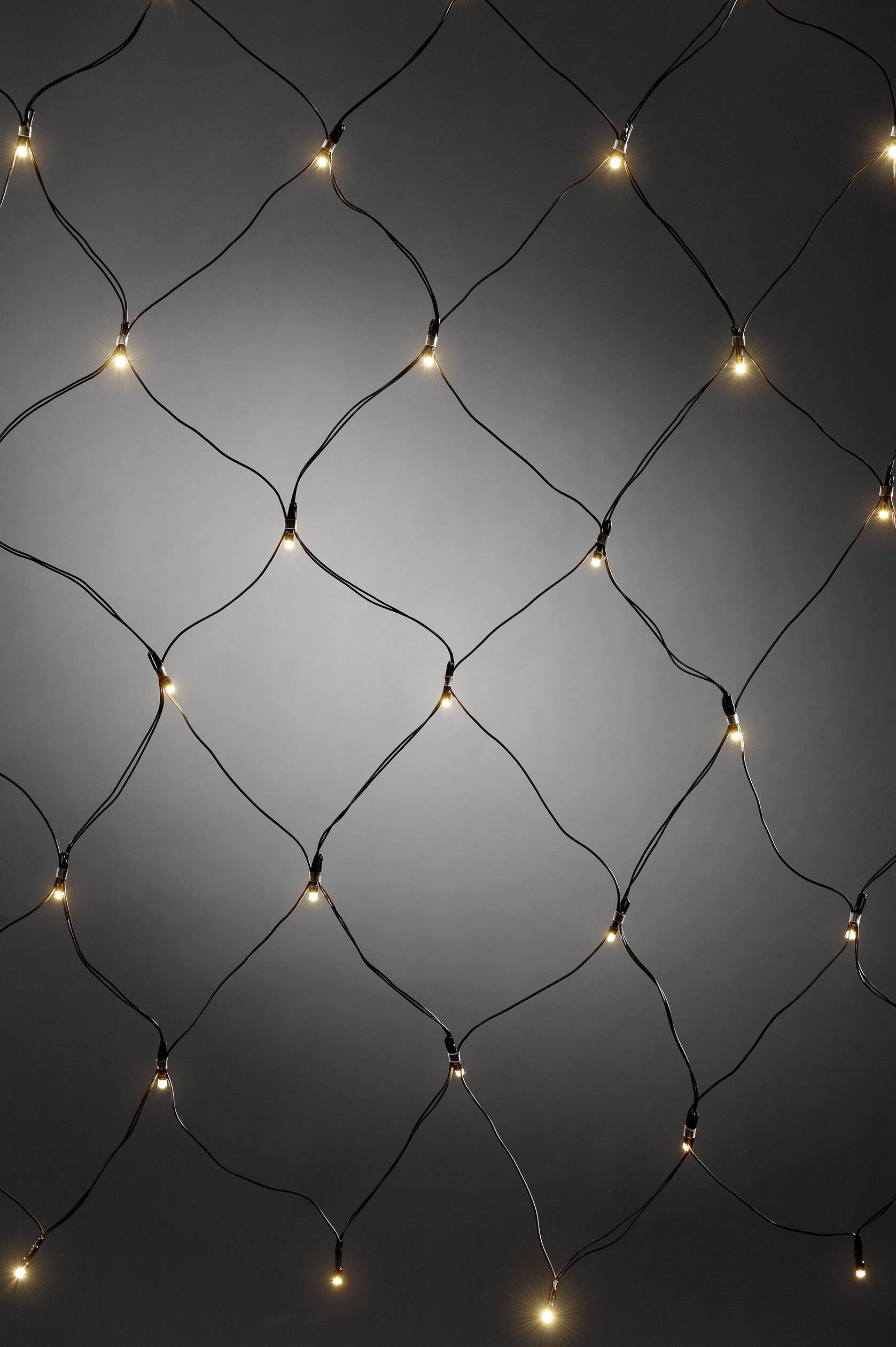 A network of glowing lights against a grey background.