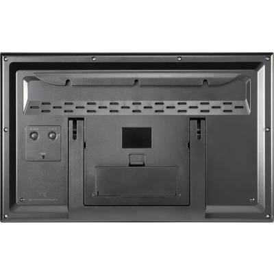 Back of a black electronic device with ventilation slots and two ports on the left side.