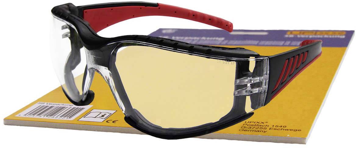 Safety goggles with black and red frame on yellow packaging. Protects the eyes during craft work or laboratory activities.