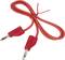 Red connecting cable with banana plugs at both ends, suitable for electronic applications or laboratory use.