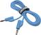 A blue Voltcraft connection cable with two banana plugs and a hook-and-loop fastener for organisation.
