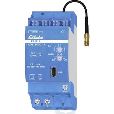 A blue FAM14 module from Eltako for controlling electrical circuits, with USB connection, antenna, and voltage adjustment button in volts.