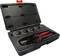 A case containing a crimping tool and several interchangeable dies for different cable or wire gauges.