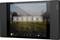 Tablet with smart home control, displaying time, date, and symbols for wellness, audio, temperature, blinds, and sauna.