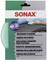 'SONAX Microfibre Care Pad' packaging; application image shows use on plastic surface in a car; multilingual description.