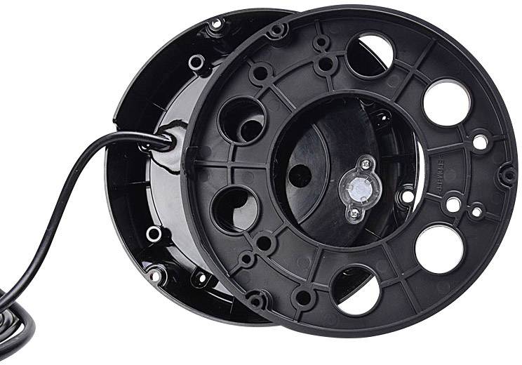 Two overlapping black plastic discs with circular cutouts and a cable protruding from the side.