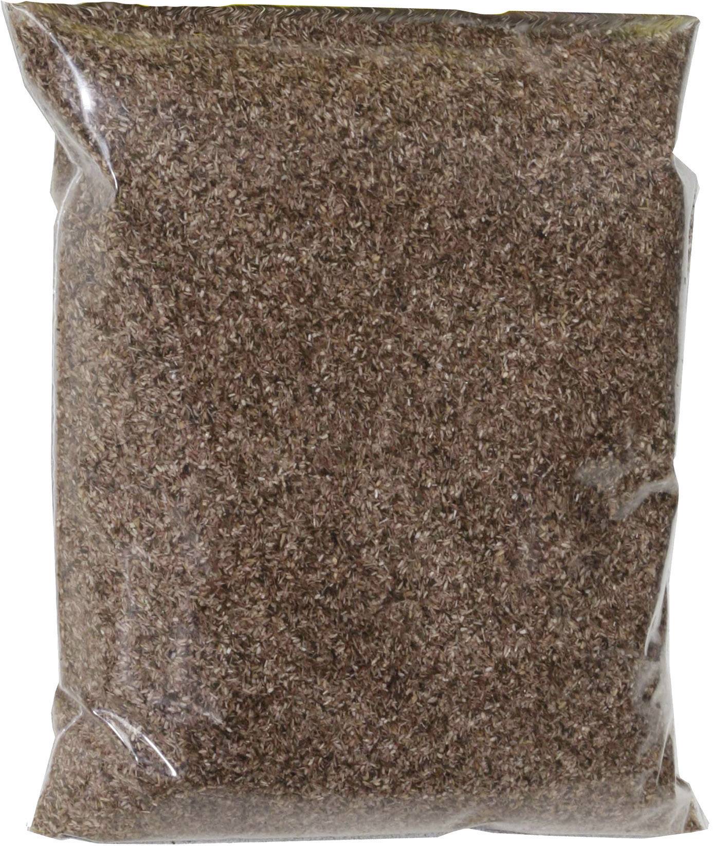 A transparent plastic packaging, filled with brown seeds or grains.