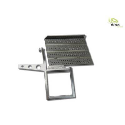 A metal component with a rectangular base shape and perforated surface, suitable for model construction purposes.
