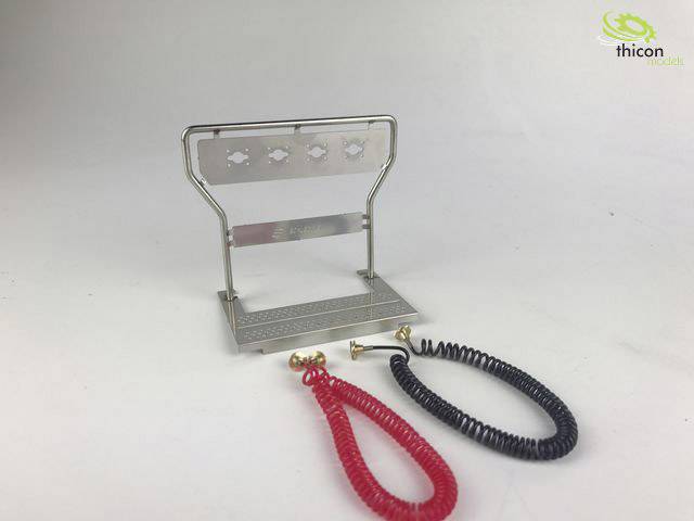 Metal stand with angled shelf and two spiral cables in red and black. 'thicon Models' logo in the top right corner.