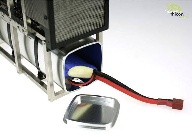 A rectangular metal container with an open lid reveals internal cables and a blue battery. 'thicon models' logo positioned in the top right corner.