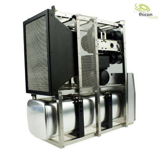 Metal model cooling radiator and water tank mounted on a steel frame, mesh netting on the left, metal cylinder on the right. Brand logo in the top right corner.