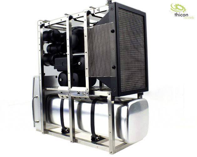 A model of a lorry fuel system, comprising silver tanks and black pipes, mounted in a metallic frame.