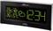 'Digital thermometer and hygrometer with clock display. Indoor temperature 23.5°C, humidity 48%. Outdoor temperature 26.1°C, humidity 57%. Time 12:34.'