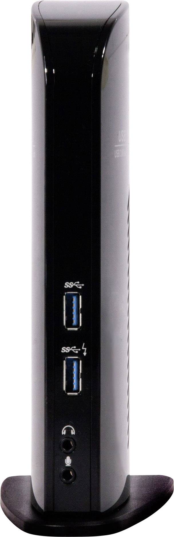 A black mini PC stands vertically on a stand. Two USB ports and audio ports are visible at the front.