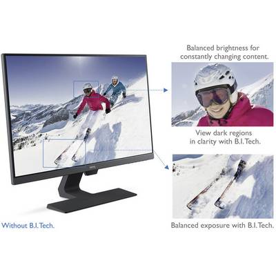 Two skiers on a snow-covered ski slope in sunny weather. The monitor displays the enhanced visibility through B.I.Tech.