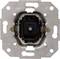 A metal switch with two screws and a central plastic component revealing the switching mechanism inside.