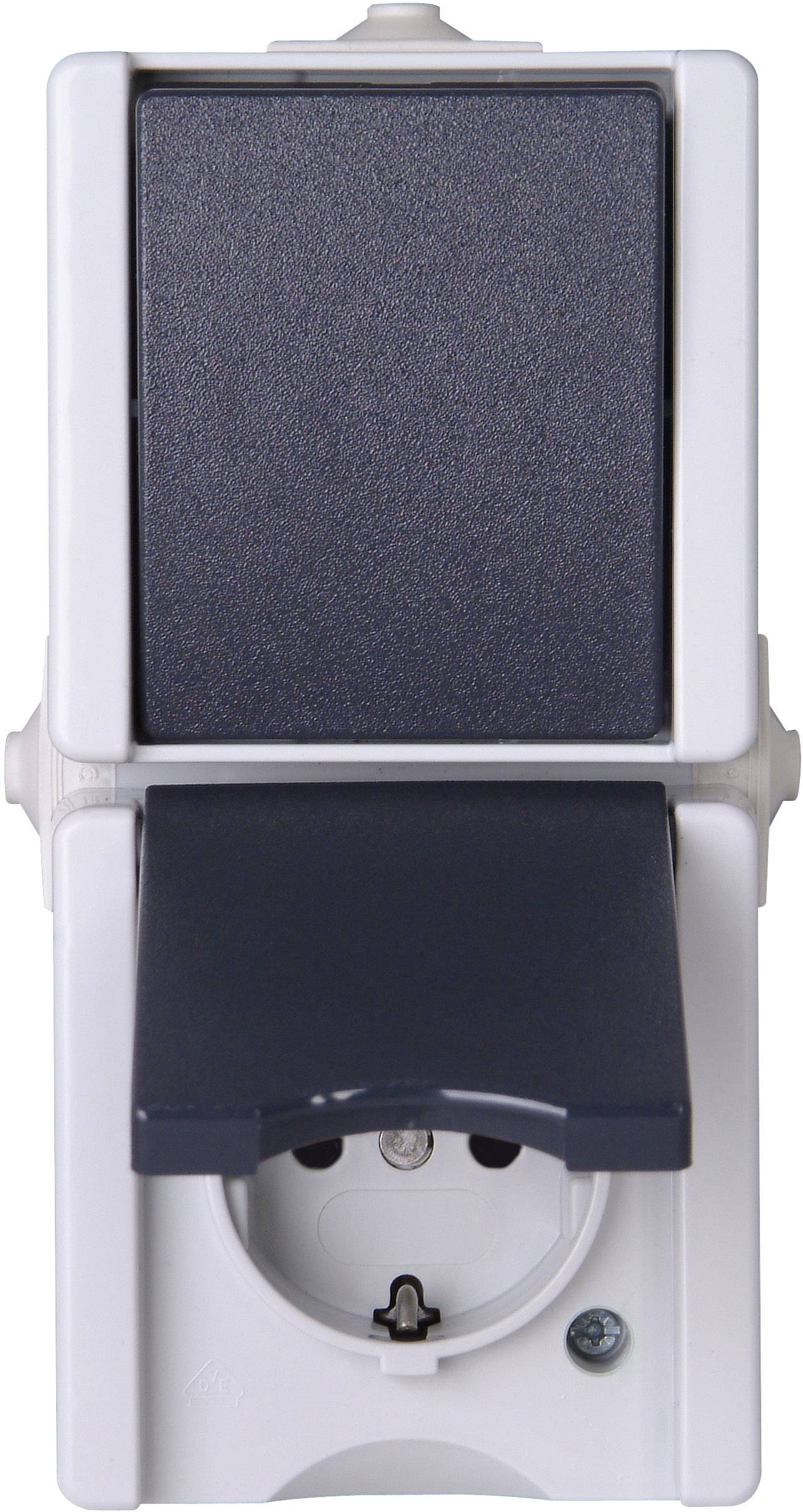 A white socket with a black cover that can be flipped open to reveal the socket.