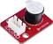 A red module with an electric buzzer, a white plug, and the inscription 'REMOVE SEAL AFTER WASHING'.