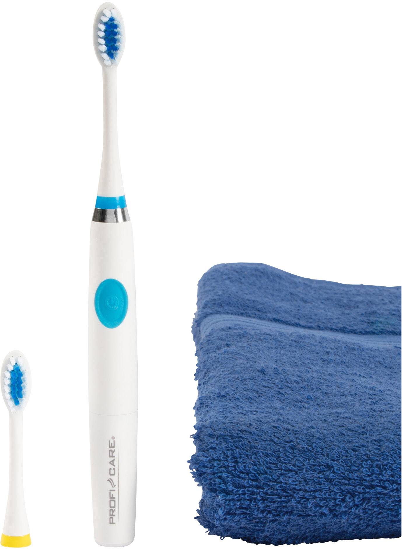 Electric toothbrush with replacement head next to a navy blue towel.