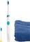 Electric toothbrush with replacement head next to a navy blue towel.