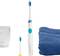 Electric toothbrush next to a replacement brush head, glass of water and folded blue towel on white background.