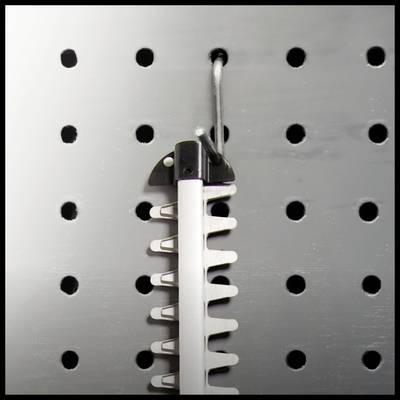 Wall-mounted rack with hooks, on which a tool with blades is hanging.