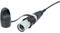 An XLR plug with a black plastic cover, connected to an audio cable. Commonly used in professional audio technology.