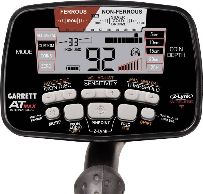 Metal detector screen with settings for ferrous and non-ferrous metals. Displays '92' as the current value.