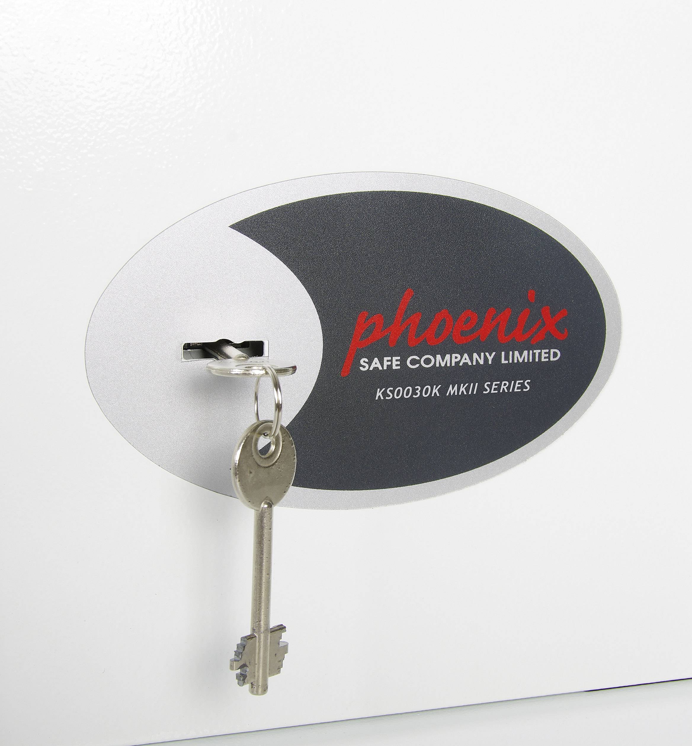 The key is stuck in the lock of a safe by the 'Phoenix Safe Company Limited', Model KS0030K MKII Series.