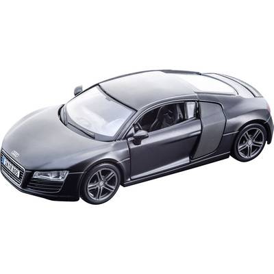 A black sports car with an open driver's window, two-seater, aerodynamic design, against a neutral background.
