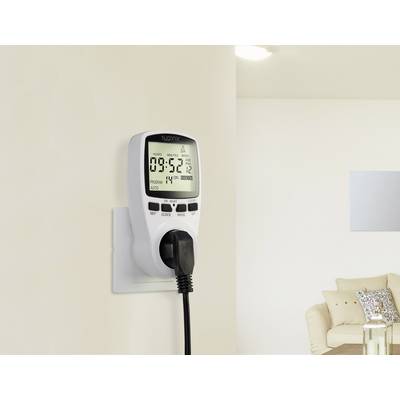 A digital timer is plugged into a socket, displays the time as 09:52, and controls a connected device.