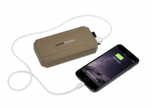 External power bank connected to smartphone. The smartphone displays a charging screen.