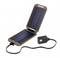 A portable solar charger connected to an action camera. Ideal for outdoor activities to generate electricity while on the move.