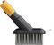 Cleaning brush with an electric handle in black and orange, shown from the side. Bristles pointing downwards. Ready for use.