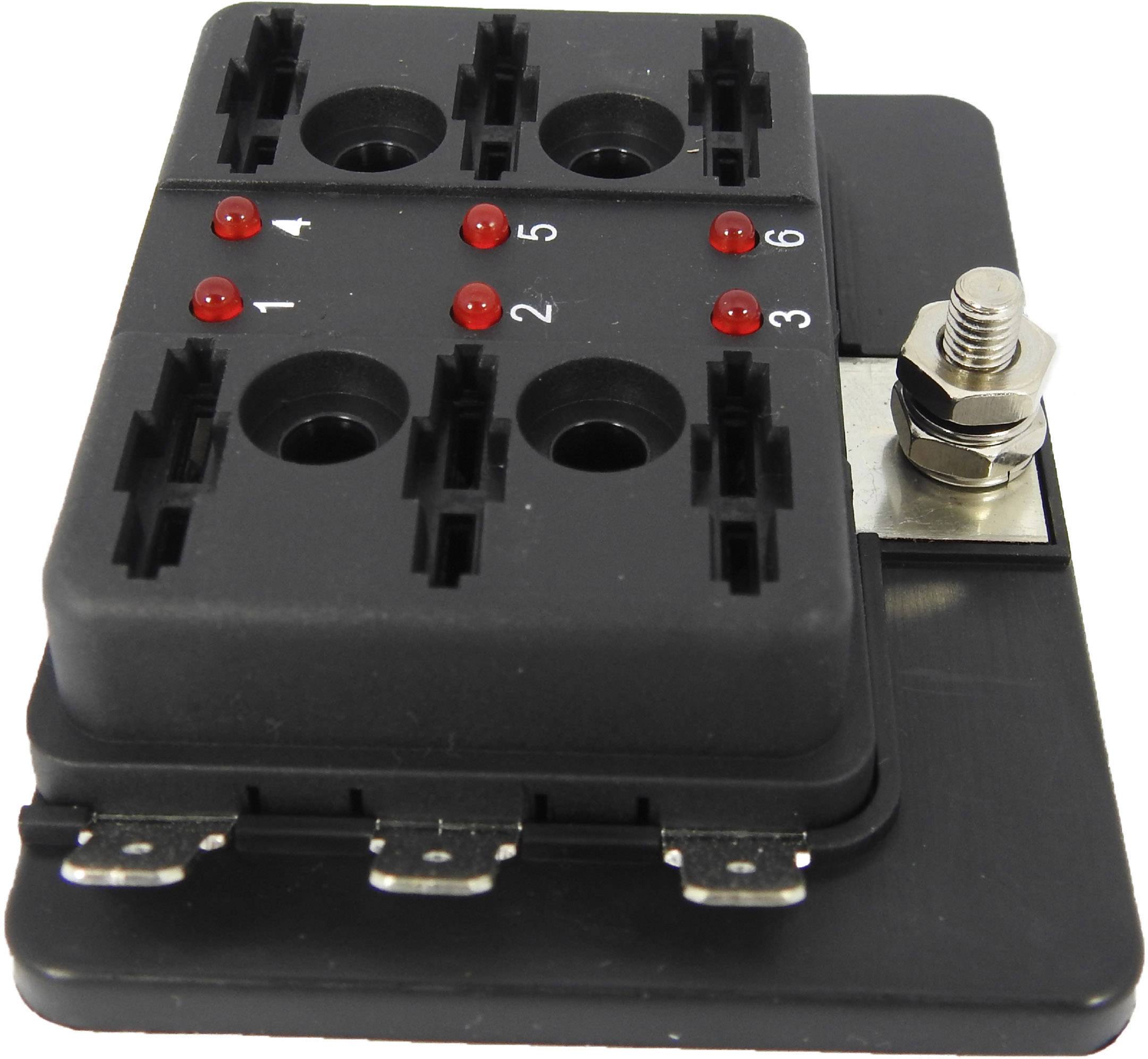 Black safety fuse housing with six slots, numbered from 1 to 6. Red LEDs indicate the status of each respective fuse.