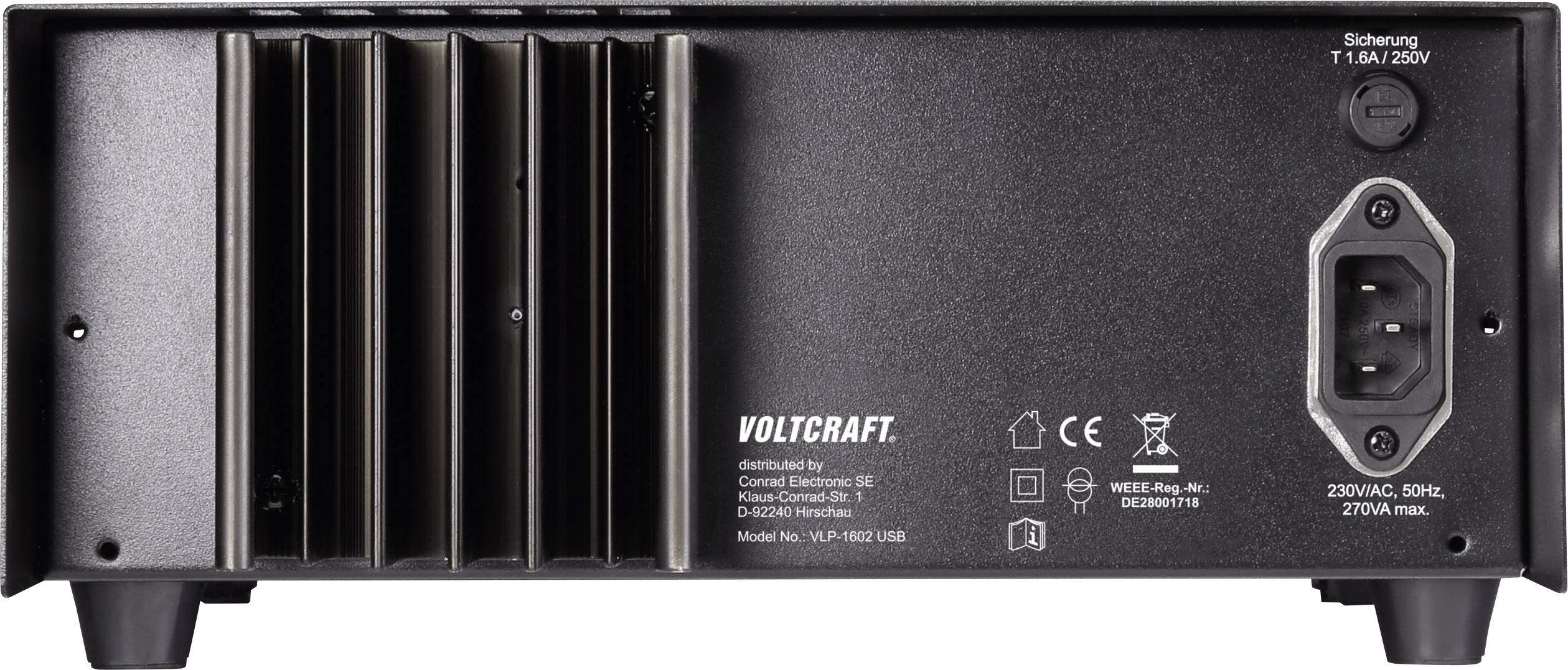 Back of a black Voltcraft power supply with ventilation slots, fuse, and power connection. Specifications text and symbols located bottom left.