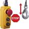 A yellow control switch with a red stop switch and two arrow buttons for raising and lowering a hook, with a 'STOP' sign alongside.