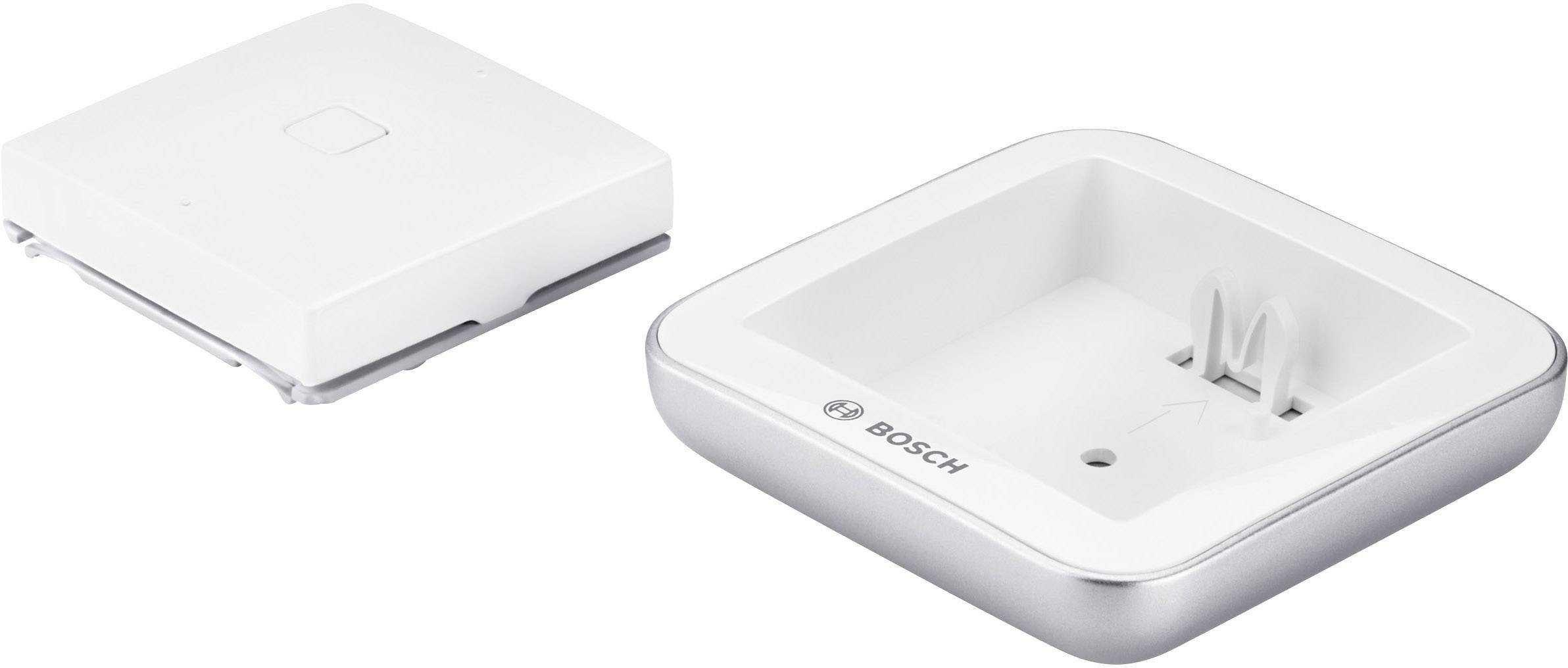 A white, square sensor and its accompanying base station from Bosch.
