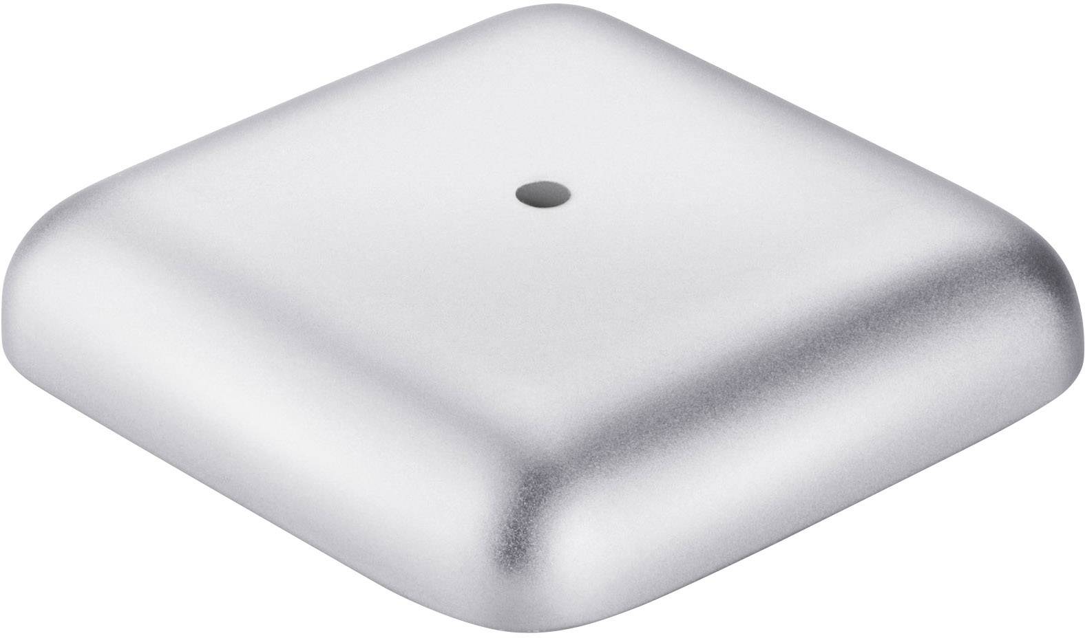 A square, silver, slightly convex object with a central black dot on its top surface.