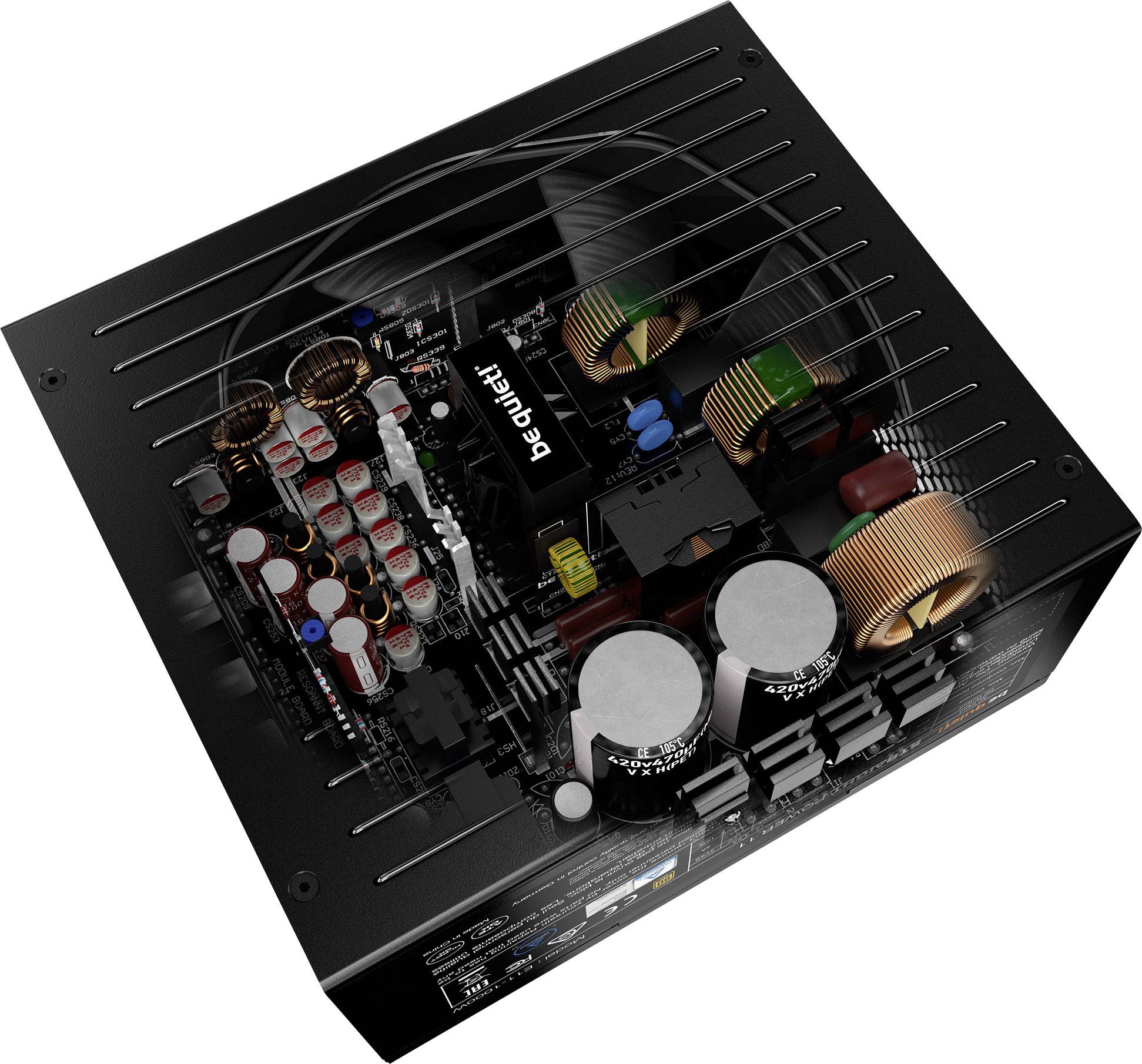 A black computer power supply unit with visible internal components such as capacitors and inductors. The 'be quiet!' logo is recognisable.