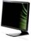 Black flat screen monitor on a stand, against a white background. The screen displays an abstract green graphic.