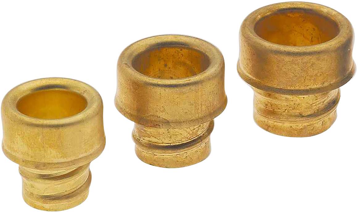 Three golden metal rings with graduated edges in different sizes on a white background, possibly used as seals or gaskets.