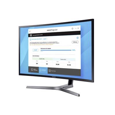 A monitor displays the user interface of the 'Samsung Magician' software with a window for SSD performance checking.
