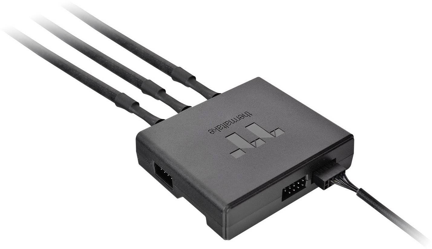 A black HDMI splitter with four ports; three input and one output cable are connected, with a control light on top.